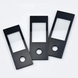 Glass panel with mounting holes and precision cutouts for display and electronic device applications